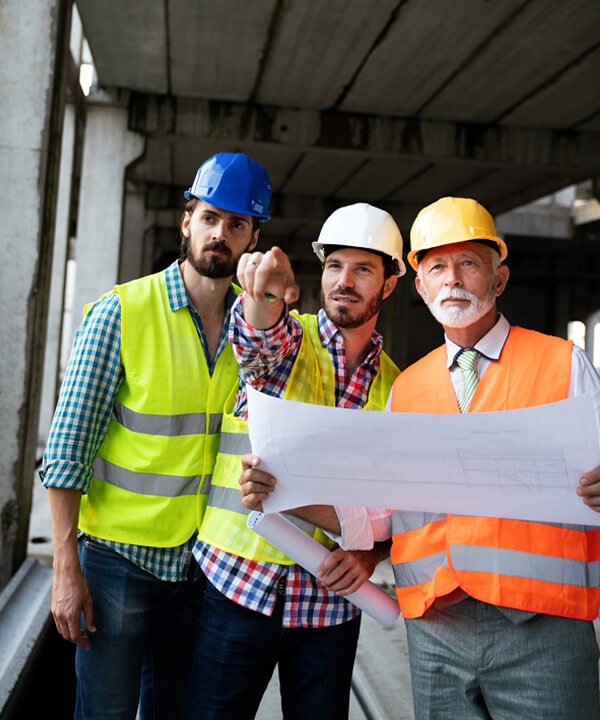 Men under bridge working